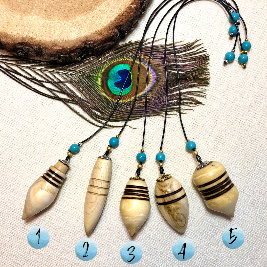 Beginner pendulums made of acacia wood and turquoise stones.